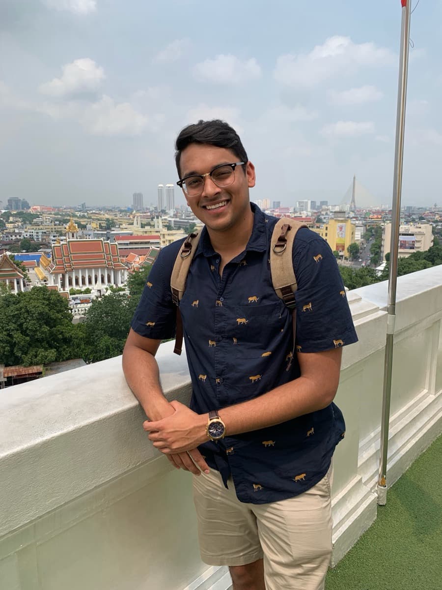 Kartik on a rooftop over Bangkok